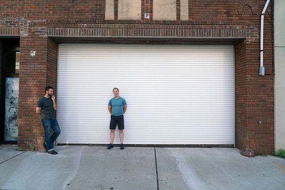 Sabin and Charlie waiting outside of the studio