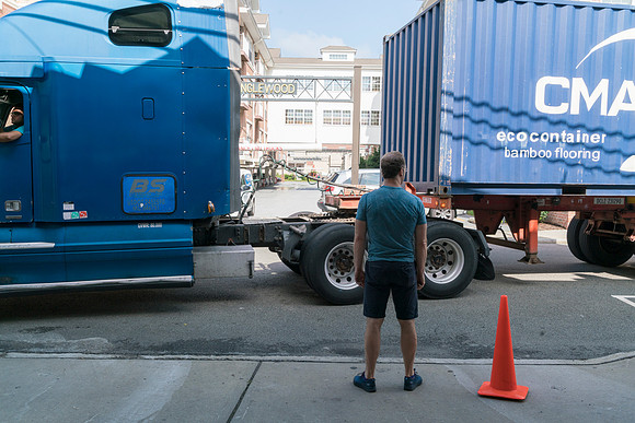 Sabin looking at Truck with delivery