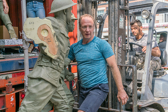 Sabin unloading sculptures