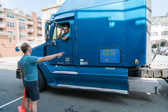 Sabin talking to the freight truck operator